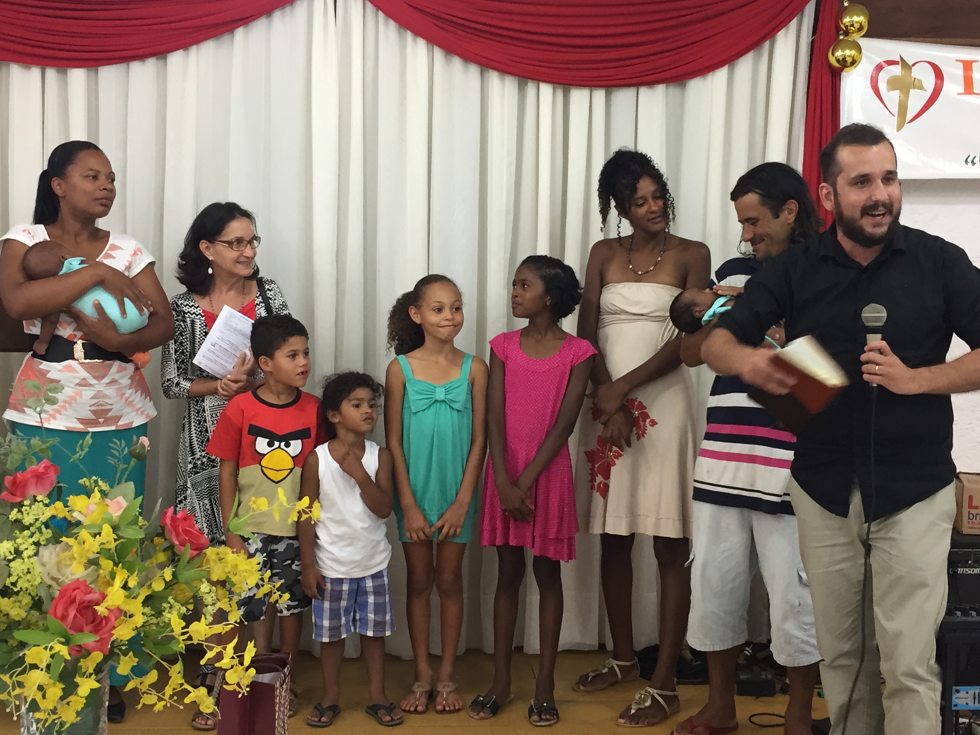 This is a family that Pastor Tiago has been working with recently, doing Bible studies, praying with them, and providing assistance.  The parents Fluvia and Felipe are drug users, and they have recently had twins.  This photo is from their recent baby dedication.